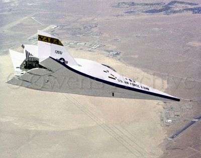 X-24B flying overhead Edwards AFB after high speed flight