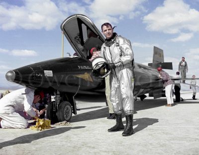 Test pilot Robert White next to X-15 after flight