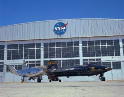 HL-10 and X-15 parked on ramp at Edwards AFB