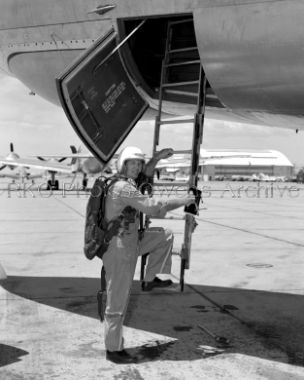 Test pilot Stan Butchart climbing into B-47