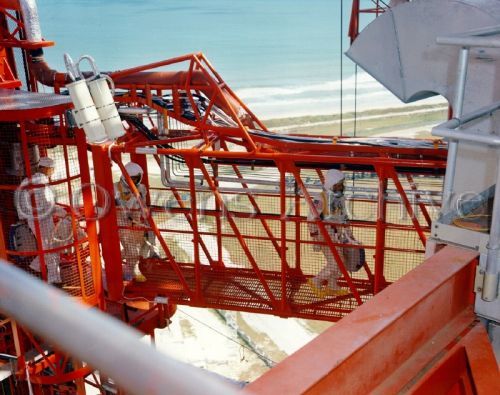 Apollo 1 crew crosses access arm to command module, January 27, 1967