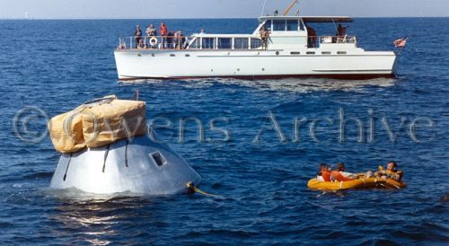 Crew of Apollo 1 relaxing in life raft during water egress training