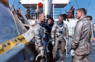 Backup crewmen for the first manned Apollo 1 mission talks to Gus