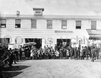 Workmen in front of Trimming Shop