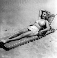 Carole Landis wearing swimsuit