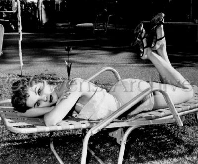 Debra Paget poolside