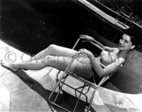 Debra Paget poolside