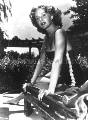 Rhonda Fleming wearing swimsuit