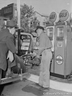 Gulf Gas Station Attendant Pumping Gas 1942