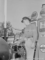 Gulf Gas Station Attendant Pumping Gas 1942