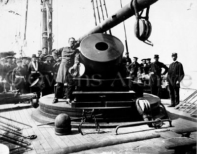 Officer next to large mortar 