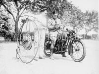 Velocipede Rider getting Ticket from Motorcycle Police 