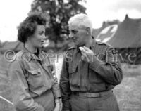 Red Cross nurse with U.S. 1st Army Chaplain