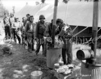Nurses with 13th Field Hospital in Chow Line