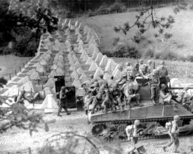 US 3rd Armored Sherman Tank Drive Past Siegfried Line