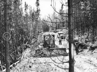 Caterpillar tractor working on Alcan Highway