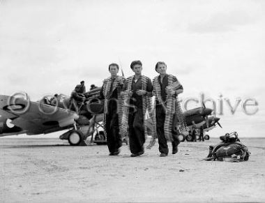 RAF ground crew carry ammo belts