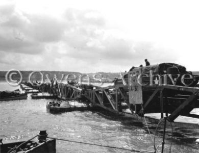 DUKW moves along Mulberry floating road