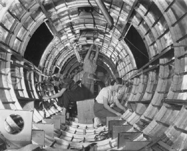 Rosie the Riveter Working on B-17F Bomber