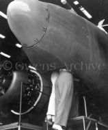 Two Women Working in Bombardier Hatch