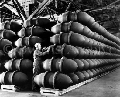 Rosie the Riveter Inspects 1,000 Pound Bombs