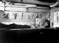 Sailor Reading in Bunk Aboard U.S.S. Capelin