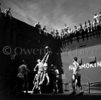 Gerald Ford playing basketball, USS Monterey