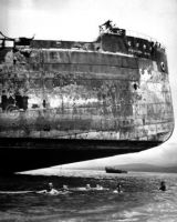 US Troops swim under Kinugawa Maru