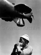 Sailor Eating Under Torpedo, New London, Ct