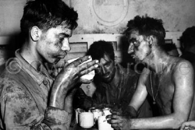 Marines relaxing after 48hrs. of battle, Eniwetok Atoll