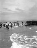 Troops storm a North African beach, 1944