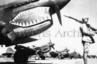 Chinese soldier guards P-40 