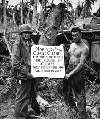 Marines salute the US Coast Guard on Guam