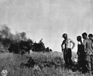 American Soldiers with German Pilot After Battle