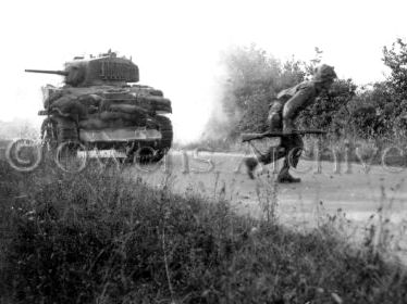 Sherman M5A1 Stuart Tank in Battle