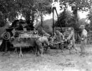 US Soldiers Repair Tanks Near Front Line