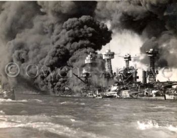 Battleship Row on fire Pearl Harbor