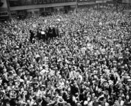 Large crowds of people celebrating V-E Day