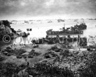 LCT's and LSM's unload supplies on Okinawa