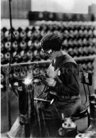 Women shipworker welding