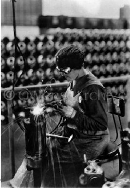 Women shipworker welding