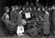 American soldier with the Y.M.C.A. girls