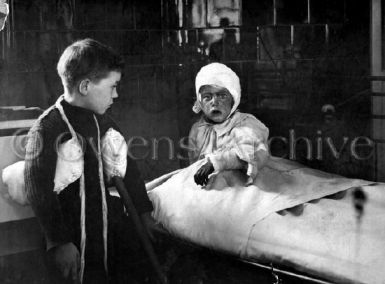 Wounded children at Red Cross, London